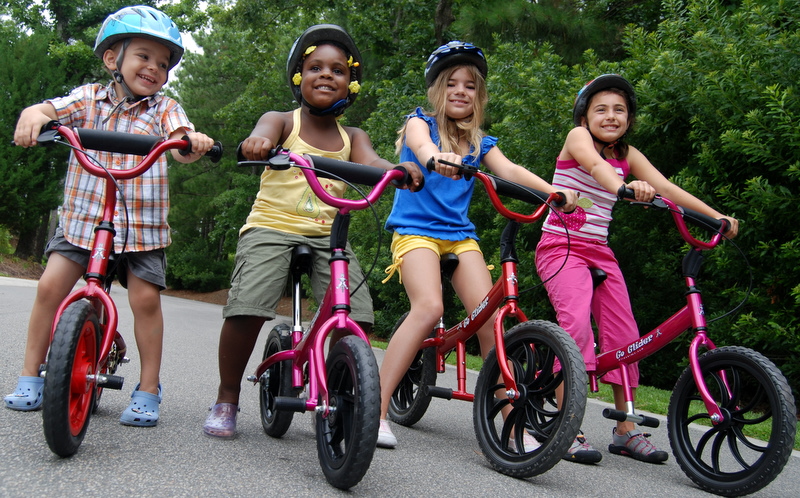 children riding bicycles